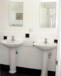 Venice Beach Contemporary Castle Designed by Architect Kenneth M. Williams - Downstairs Bathroom Dual Sinks